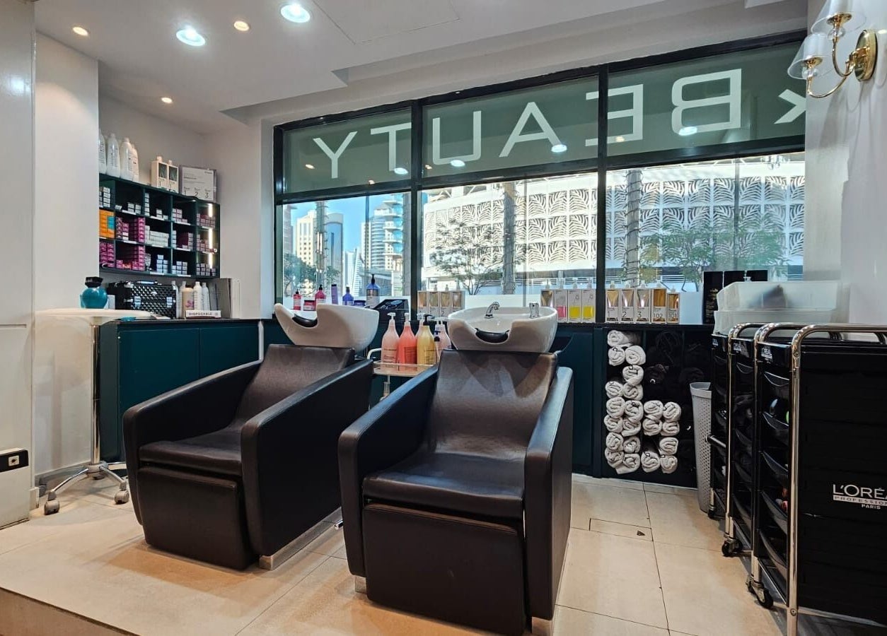 Chic wash stations at Osama Kasir Beauty Salon and Barbershop, Dubai, AE. Modern beauty experience.