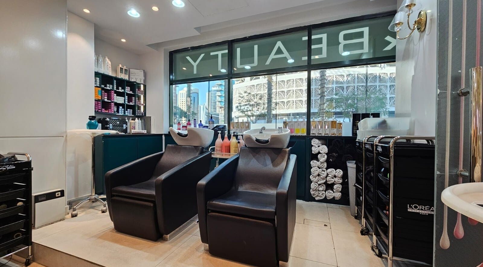 Chic wash stations at Osama Kasir Beauty Salon and Barbershop, Dubai, AE. Modern beauty experience.