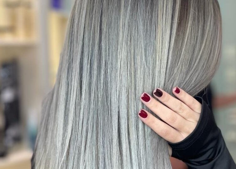 Elegant silver hair styled at Osama Kasir Beauty Salon and Barbershop, Dubai, AE.