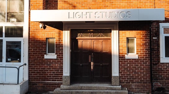 Front entrance of Ruby's Refuge at Light Studios, Plymouth, England, GB, showcasing a sleek modern design.