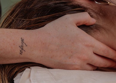 Person receiving a soothing neck massage at Ruby's Refuge at Light Studios, Plymouth, England, GB.