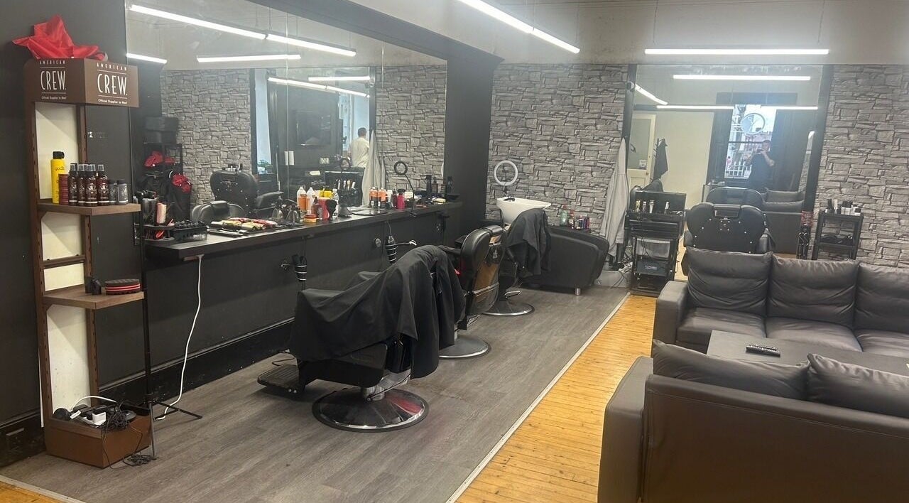 Chic salon interior at Alter Ego, Ayr, Scotland, GB featuring modern chairs and stylish decor.