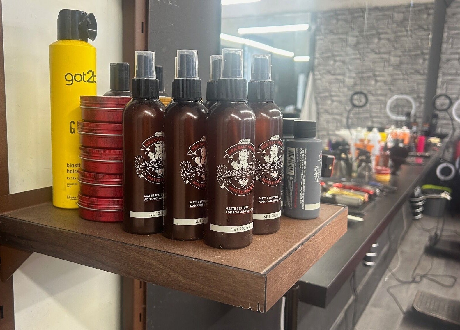 Product display at Alter Ego in Ayr, Scotland, GB featuring hairstyling essentials and salon setup.