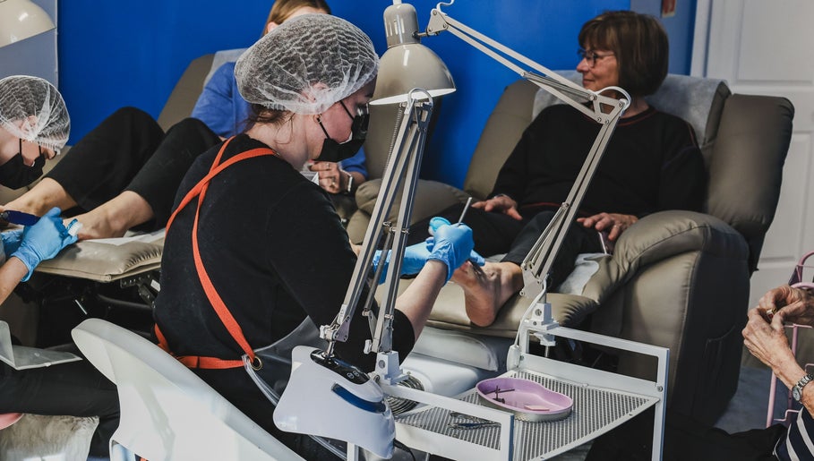 Spa guests enjoying pedicures at Salon White Blue, Edmonton, Alberta, CA. Cozy and professional care.