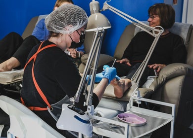 Spa guests enjoying pedicures at Salon White Blue, Edmonton, Alberta, CA. Cozy and professional care.