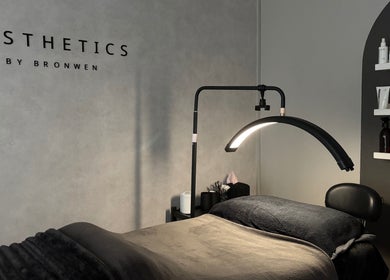 Modern treatment room at Aesthetics By Bronwen, Cape Town, Western Cape, ZA, featuring sleek decor and beauty products.