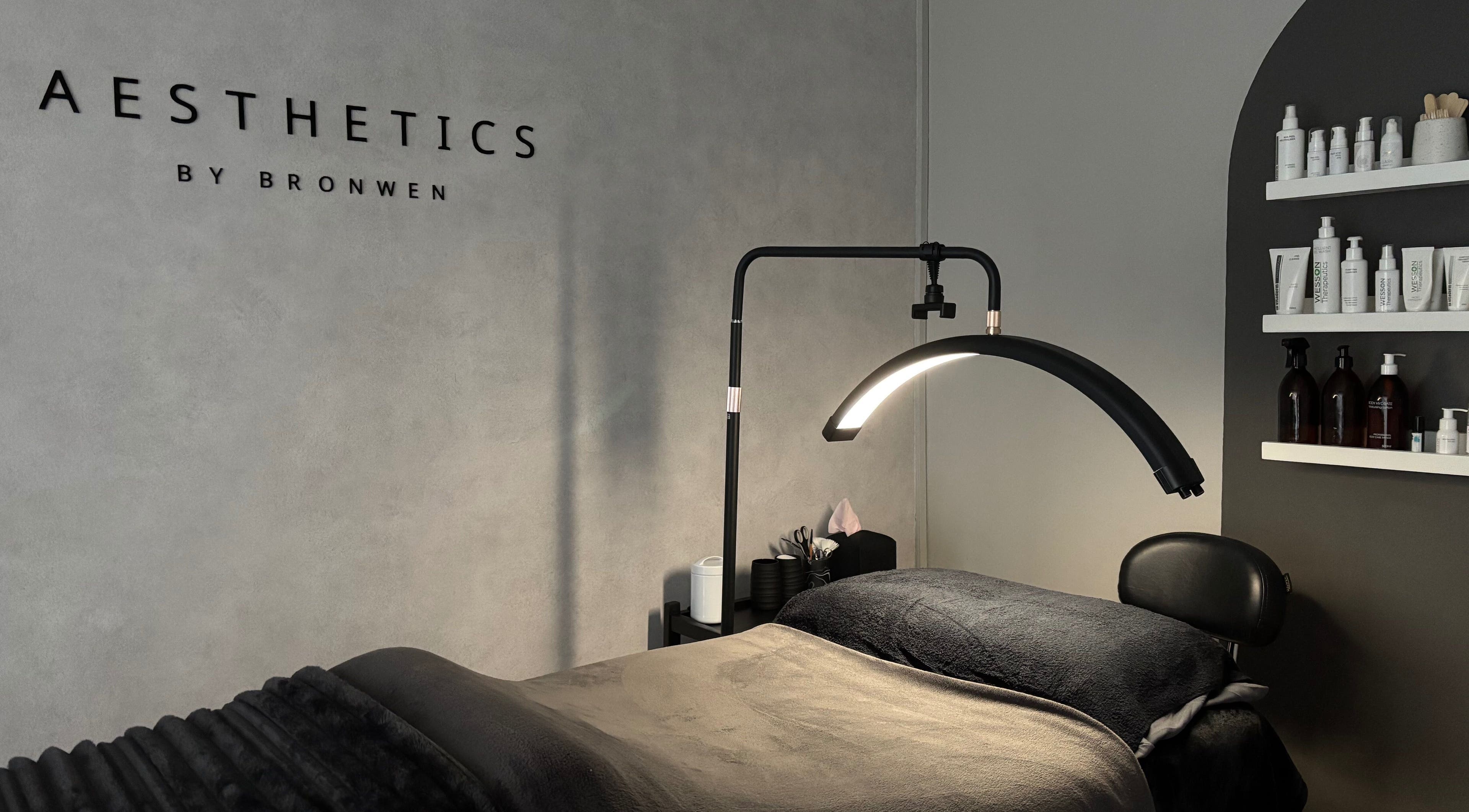 Modern treatment room at Aesthetics By Bronwen, Cape Town, Western Cape, ZA, featuring sleek decor and beauty products.