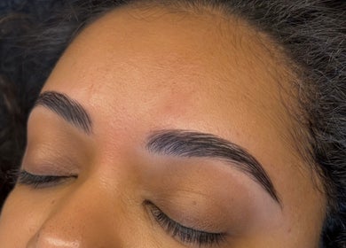 Close-up of expertly shaped eyebrows from Aesthetics By Bronwen in Cape Town, Western Cape, ZA.