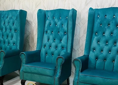 Elegant blue armchairs at Pixi Dust, Kuala Lumpur, Wilayah Persekutuan Kuala Lumpur, MY for luxury relaxation.