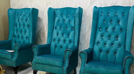 Elegant blue armchairs at Pixi Dust, Kuala Lumpur, Wilayah Persekutuan Kuala Lumpur, MY for luxury relaxation.