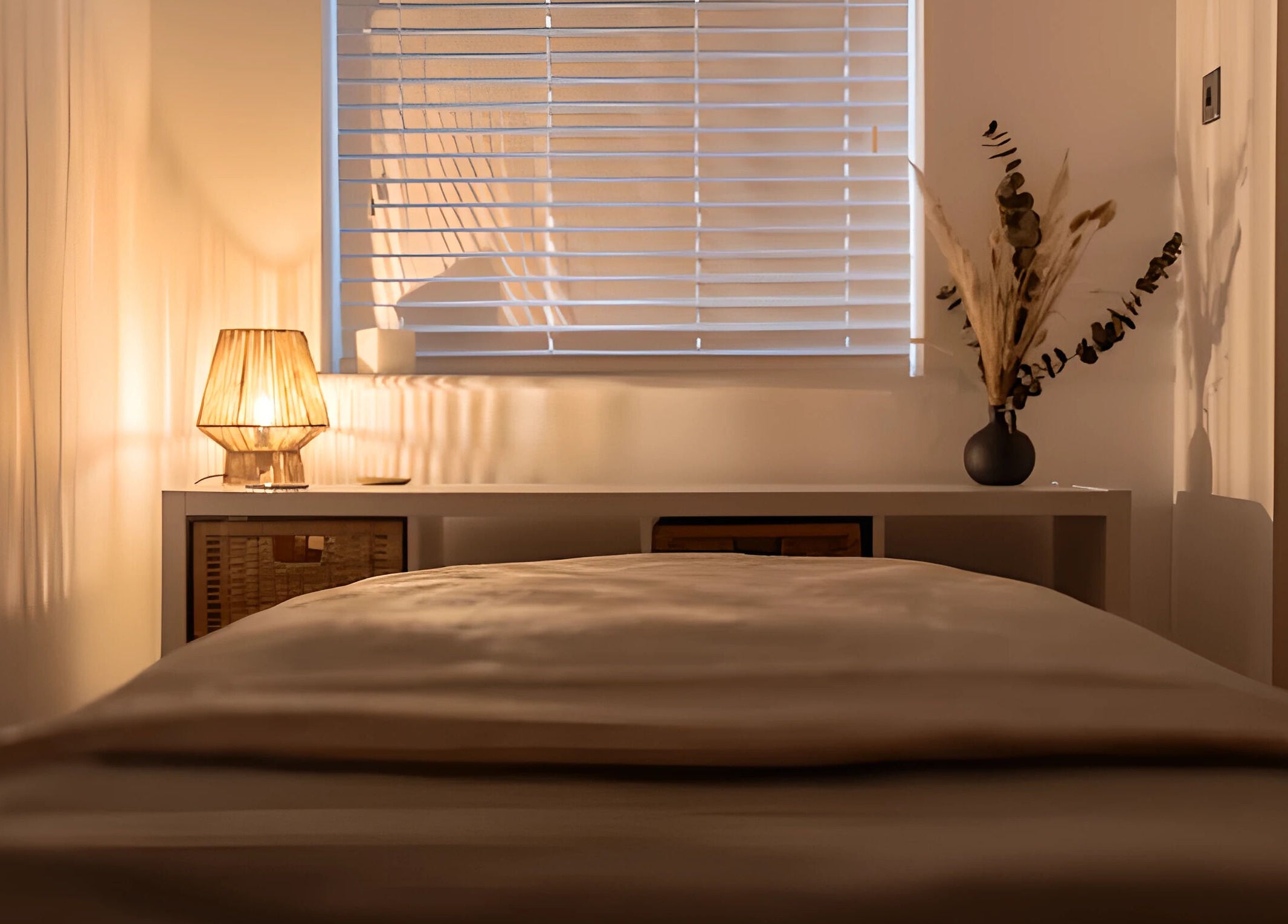Relaxing massage room at Sage Massage, Wilmslow, England, GB with soothing lighting and a cozy atmosphere.