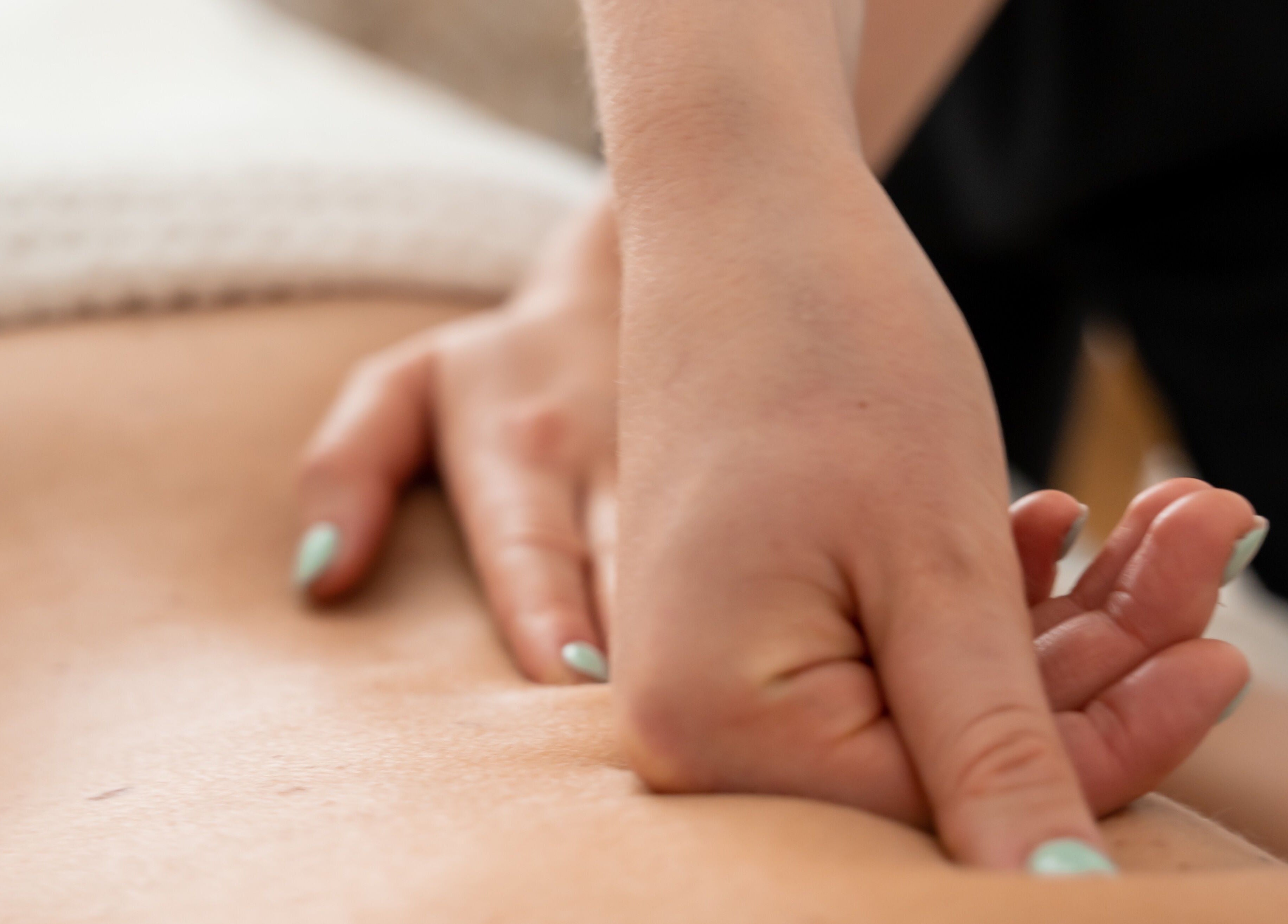 Close-up of a relaxing back massage at Sage Massage, Wilmslow, England, GB, showcasing professional care.