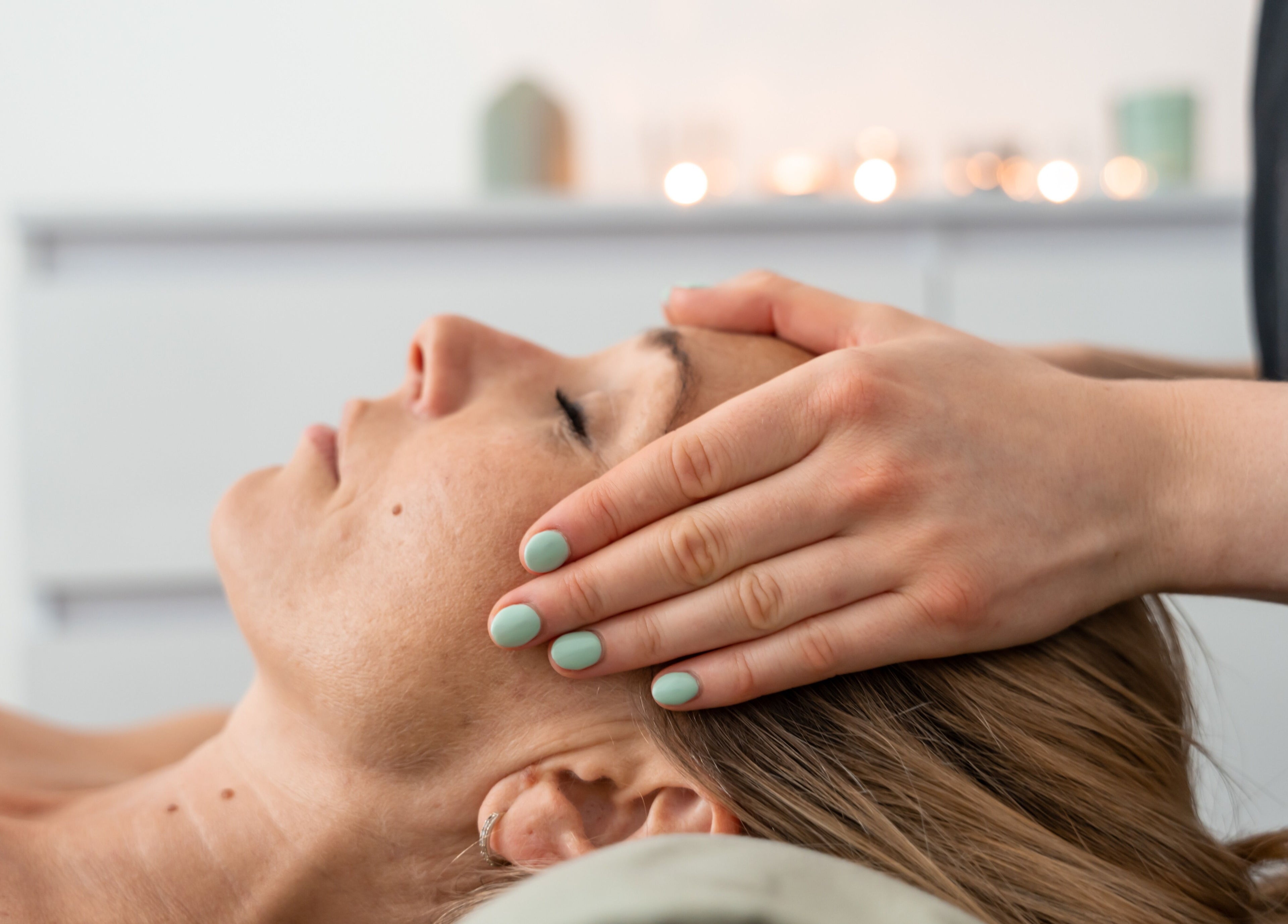 Relaxing head massage at Sage Massage, Wilmslow, England, GB, promotes wellness and tranquility.