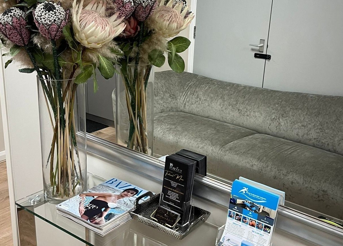 Chic lounge area at The Wax Edit - Beauty by SM in Eaton Socon, England, GB with stylish decor and comfy seating.