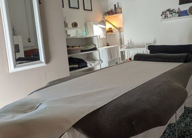 Massage room at AP Beauty Therapy, Swords, County Dublin, IE, highlighting a serene treatment bed setup.