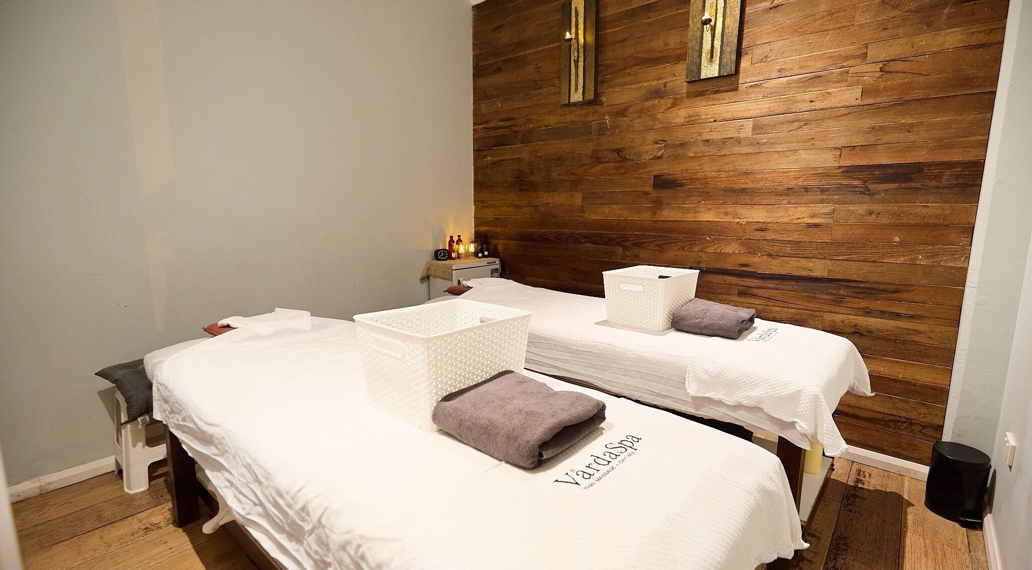 Relaxing massage room at Varda Spa Bathurst St. City, Sydney, New South Wales, AU, with two massage tables.