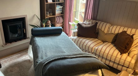 Relaxing massage area with cozy seating at Waseley Wellbeing, Worcestershire, GB.
