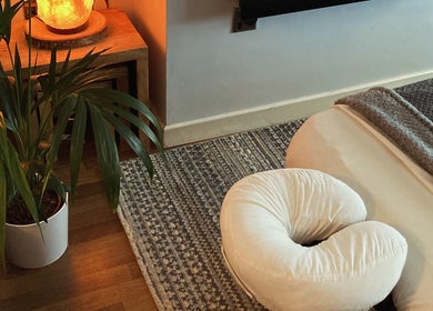 Relaxing massage setup at Waseley Wellbeing, Worcestershire, GB, with a pillow and calming decor.