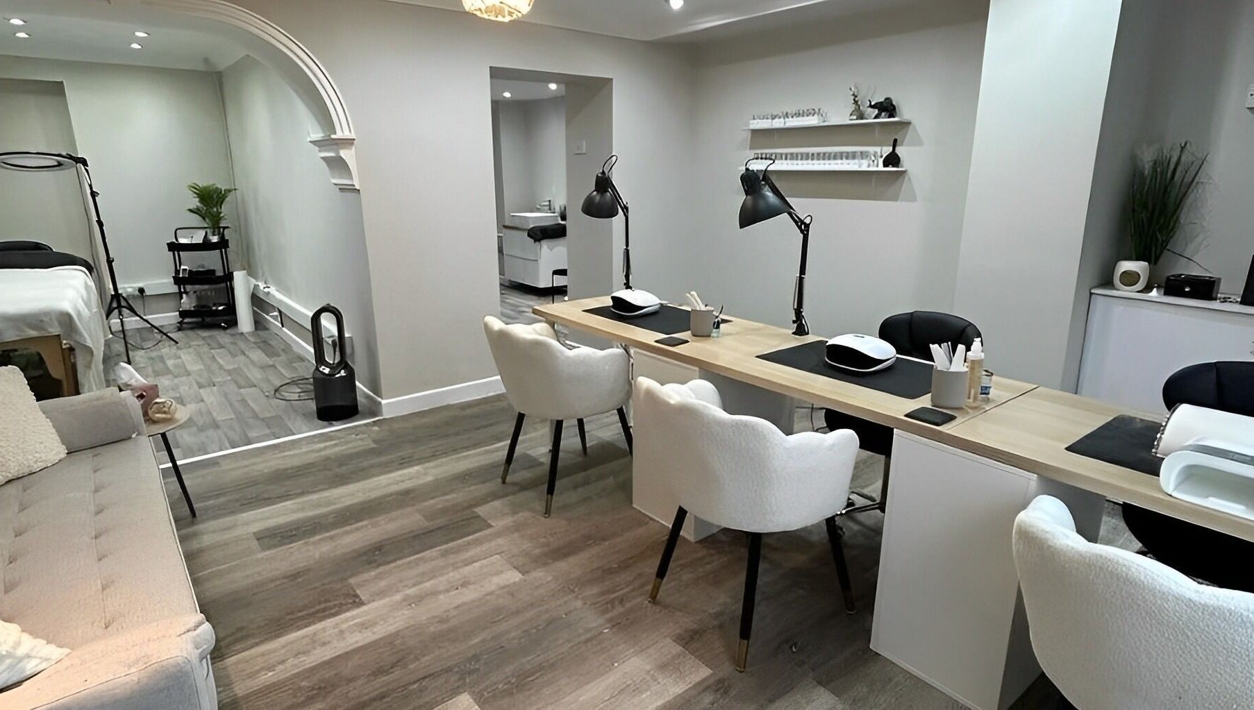 Modern nail care station at Ekb Studio, Lydney, England, GB. Features chic decor and ample seating.