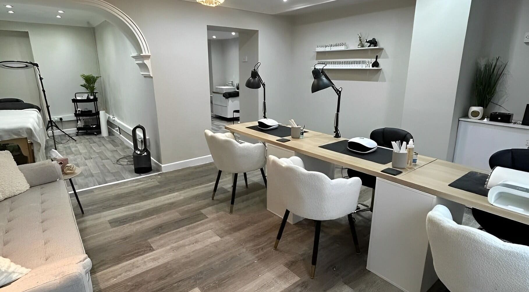 Modern nail care station at Ekb Studio, Lydney, England, GB. Features chic decor and ample seating.