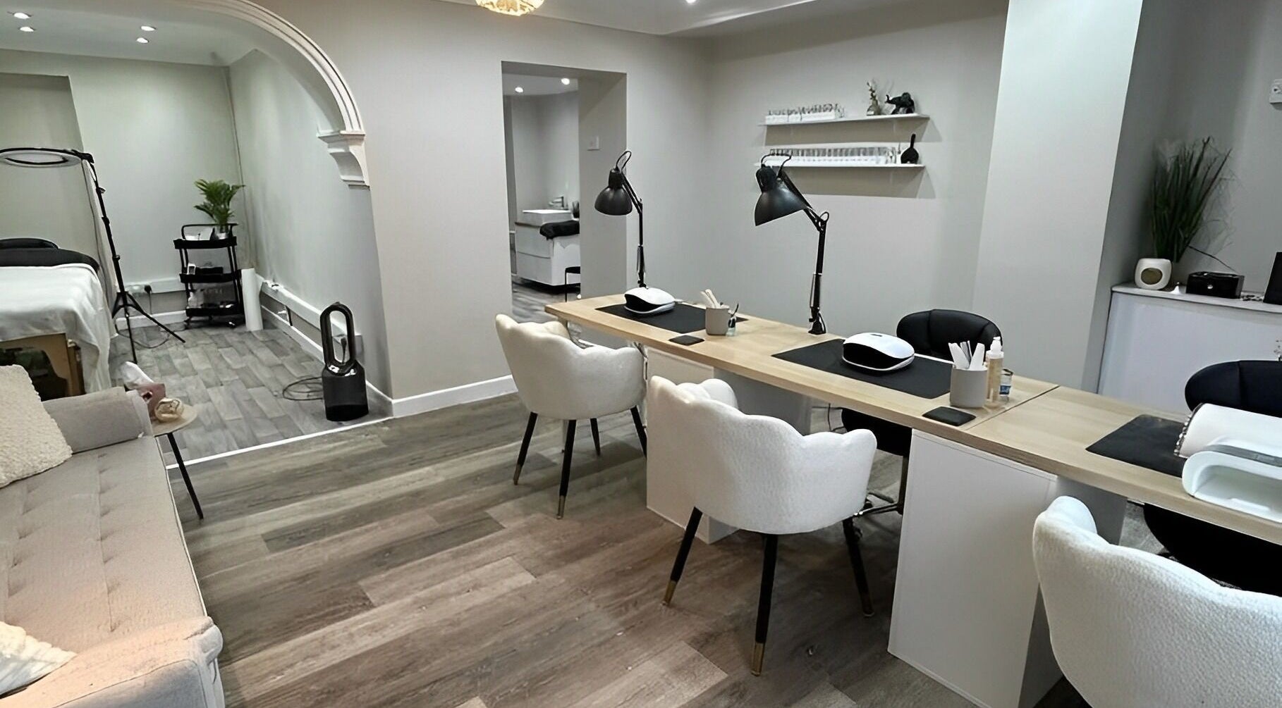 Modern nail care station at Ekb Studio, Lydney, England, GB. Features chic decor and ample seating.