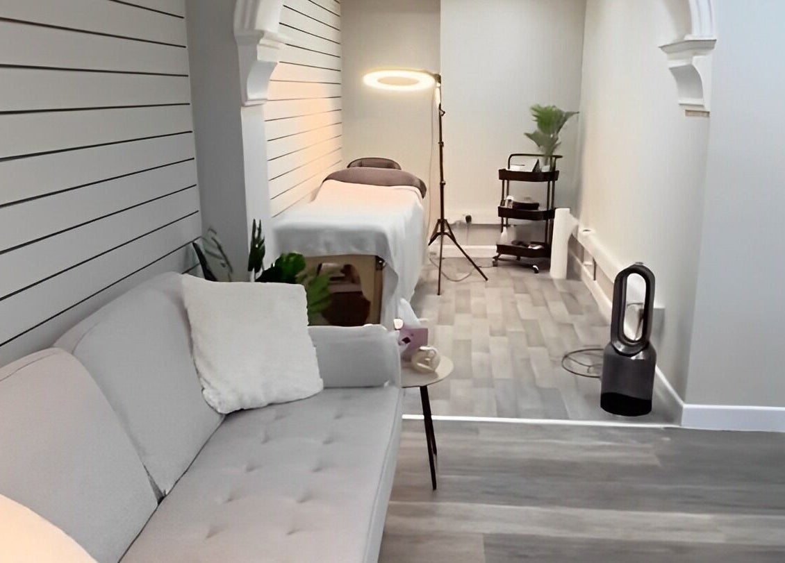 Chic treatment room at Ekb Studio, Lydney, England, GB, featuring a relaxing setup with modern decor.