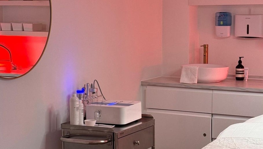 Serene spa corner at Skinrise, London, England, GB. Features sink, towels, and wellness equipment.