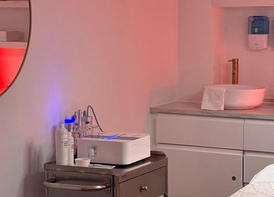 Serene spa corner at Skinrise, London, England, GB. Features sink, towels, and wellness equipment.