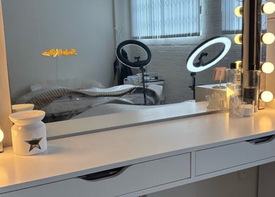 Vanity with lights at House of Glam, Newcastle upon Tyne, England, GB. Reflects modern beauty salon setup.