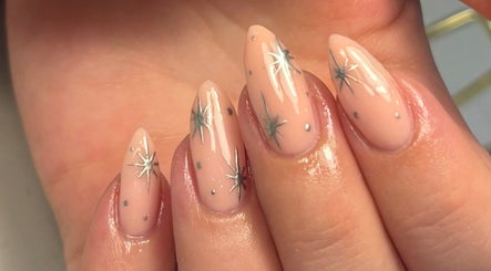 Elegant starlit manicure at House of Glam, Newcastle upon Tyne, England, GB showcasing shimmering nail art.