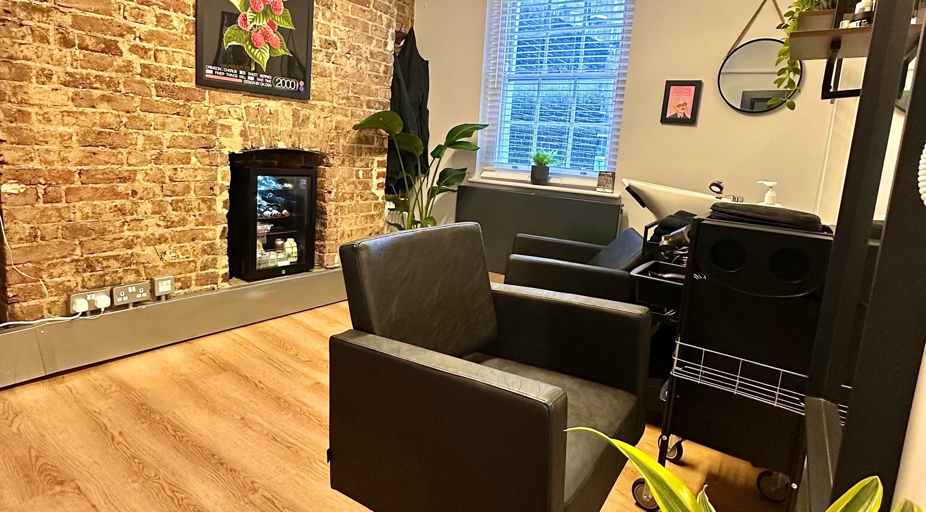 Joel Palmer Hair salon in London, England, GB with a stylish, warm interior and modern decor.