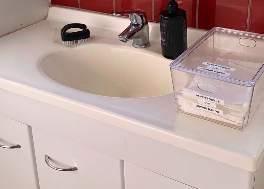 Stylish sink setup at MooMooCat Nails, Auckland, NZ featuring hand wash and towels.