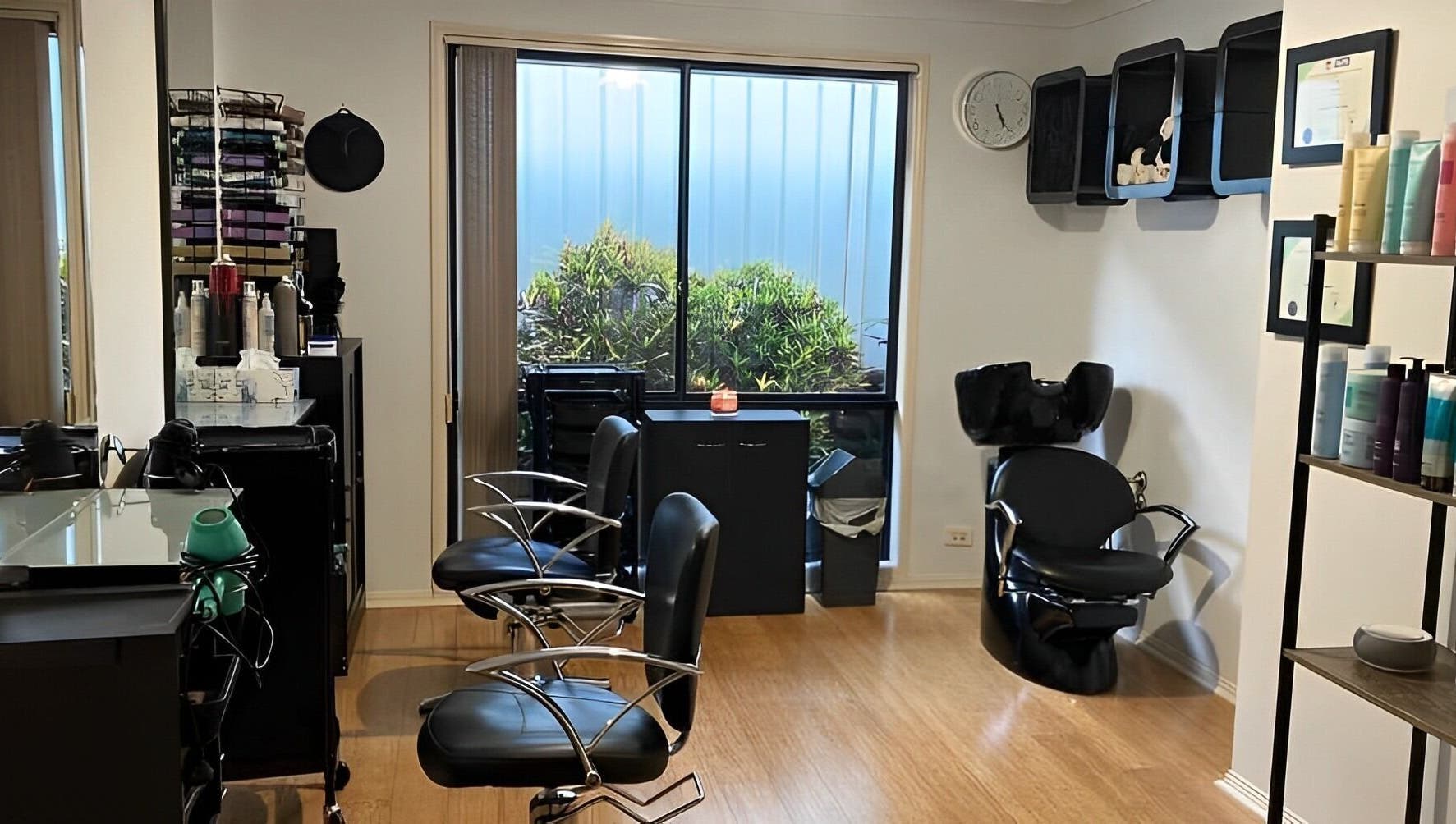 Sophisticated interior of Sammy Hair in Thornton, New South Wales, AU showcasing elegant salon chairs and modern decor.