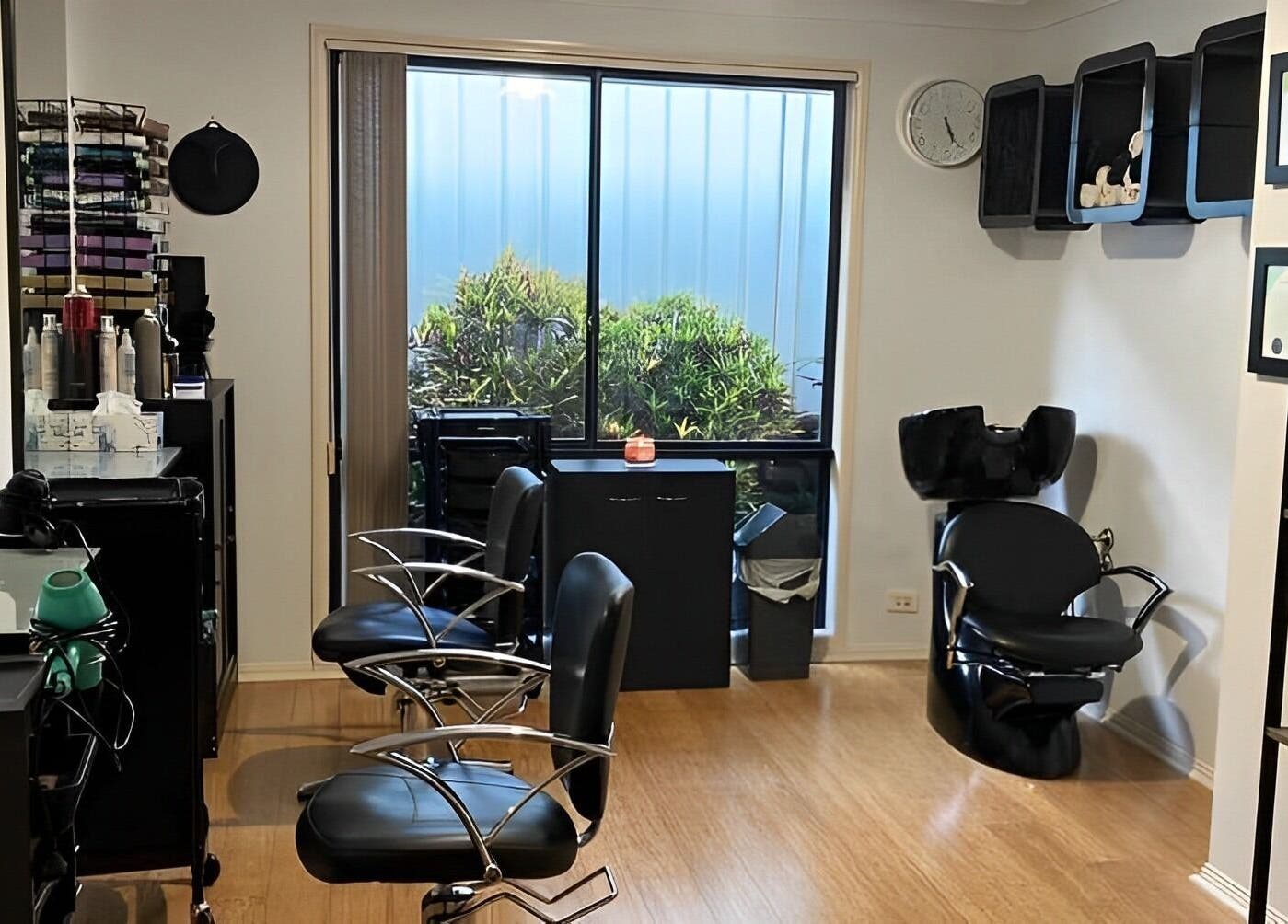 Sophisticated interior of Sammy Hair in Thornton, New South Wales, AU showcasing elegant salon chairs and modern decor.