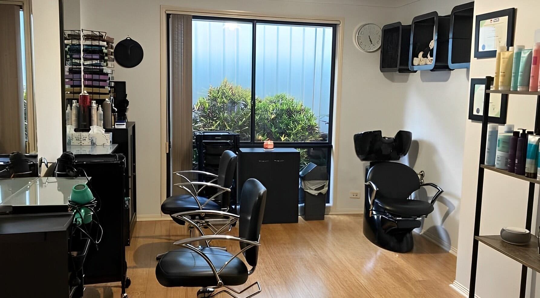 Sophisticated interior of Sammy Hair in Thornton, New South Wales, AU showcasing elegant salon chairs and modern decor.