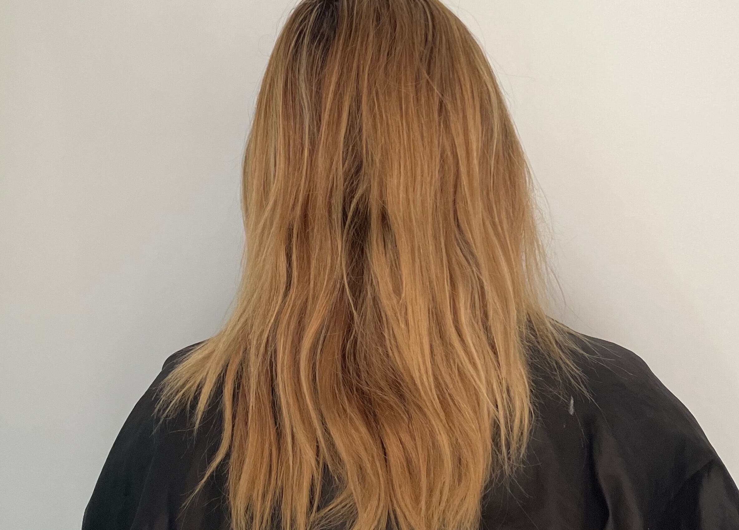 Blonde hairstyle at Sammy Hair in Thornton, New South Wales, AU. Showcasing natural texture and length.
