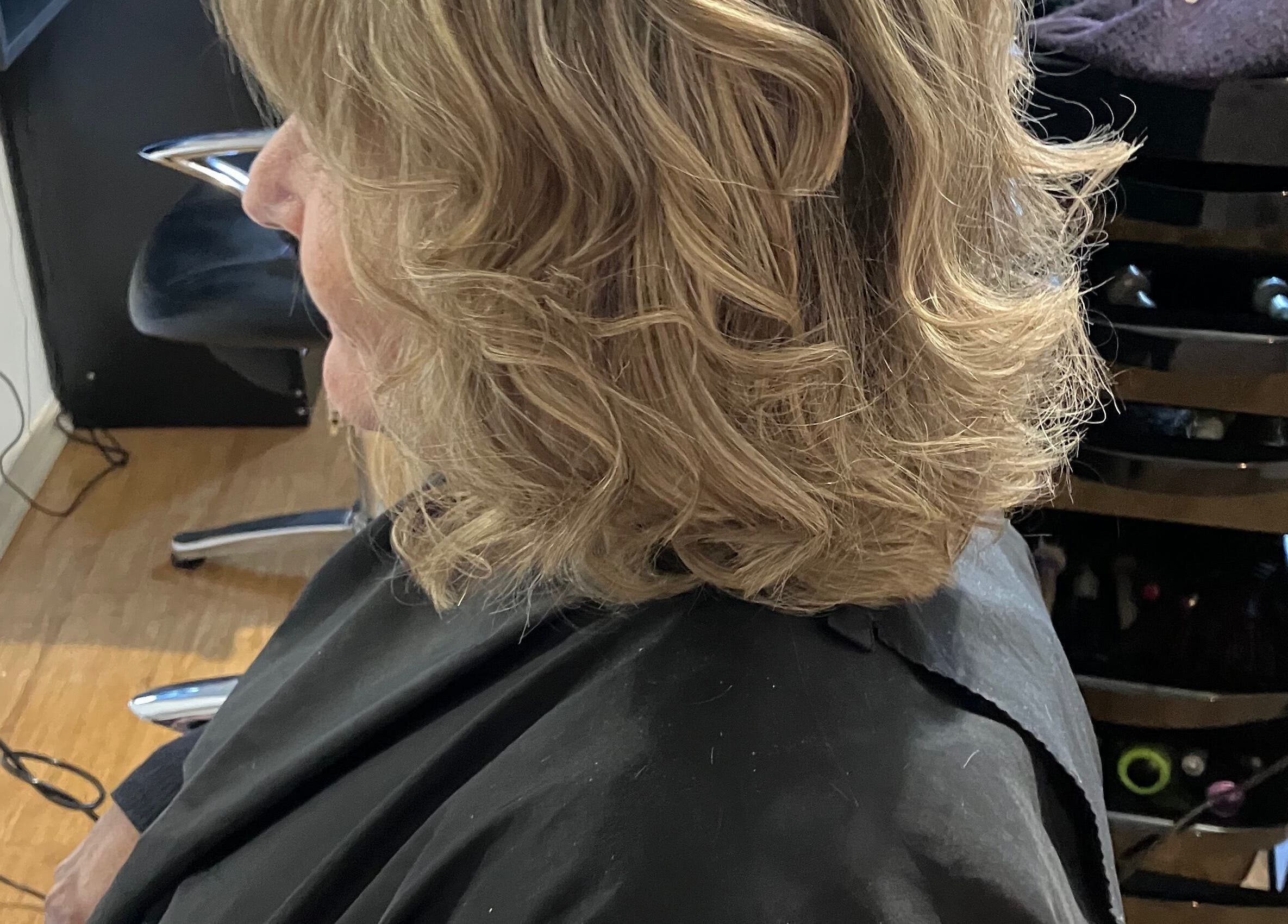 Elegant curly hairstyle at Sammy Hair in Thornton, New South Wales, AU salon.