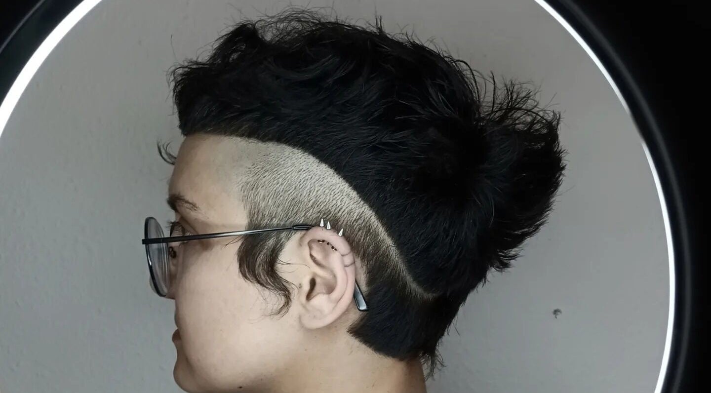 Close-up of a trendy undercut hairstyle at Mercuri Experience, Berlin, Berlin, DE, showcasing modern hair art.