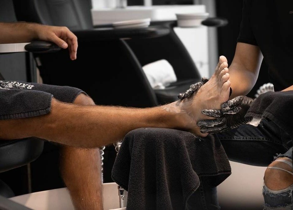 Luxurious foot treatment at Barbero Gentlemen's Lounge 2, Dubai, AE for ultimate relaxation.