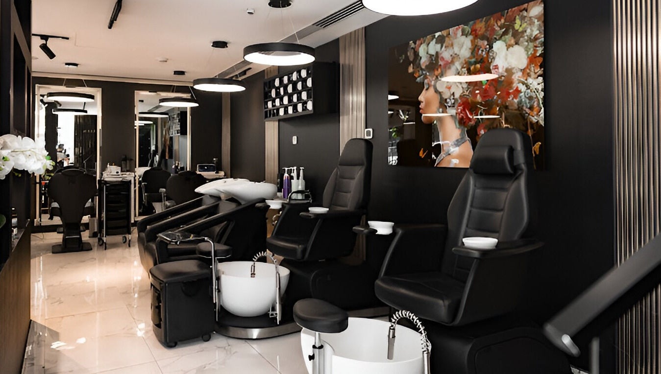 Interior of Barbero Gentlemen's Lounge in Dubai, AE showcasing sleek seating and modern decor.