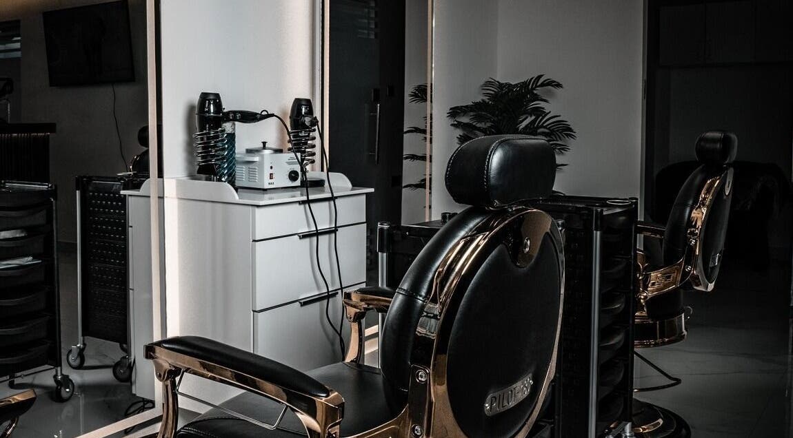Sleek barber chair at Barbero Gentlemen's Lounge, Dubai, AE showcasing premium grooming setup.