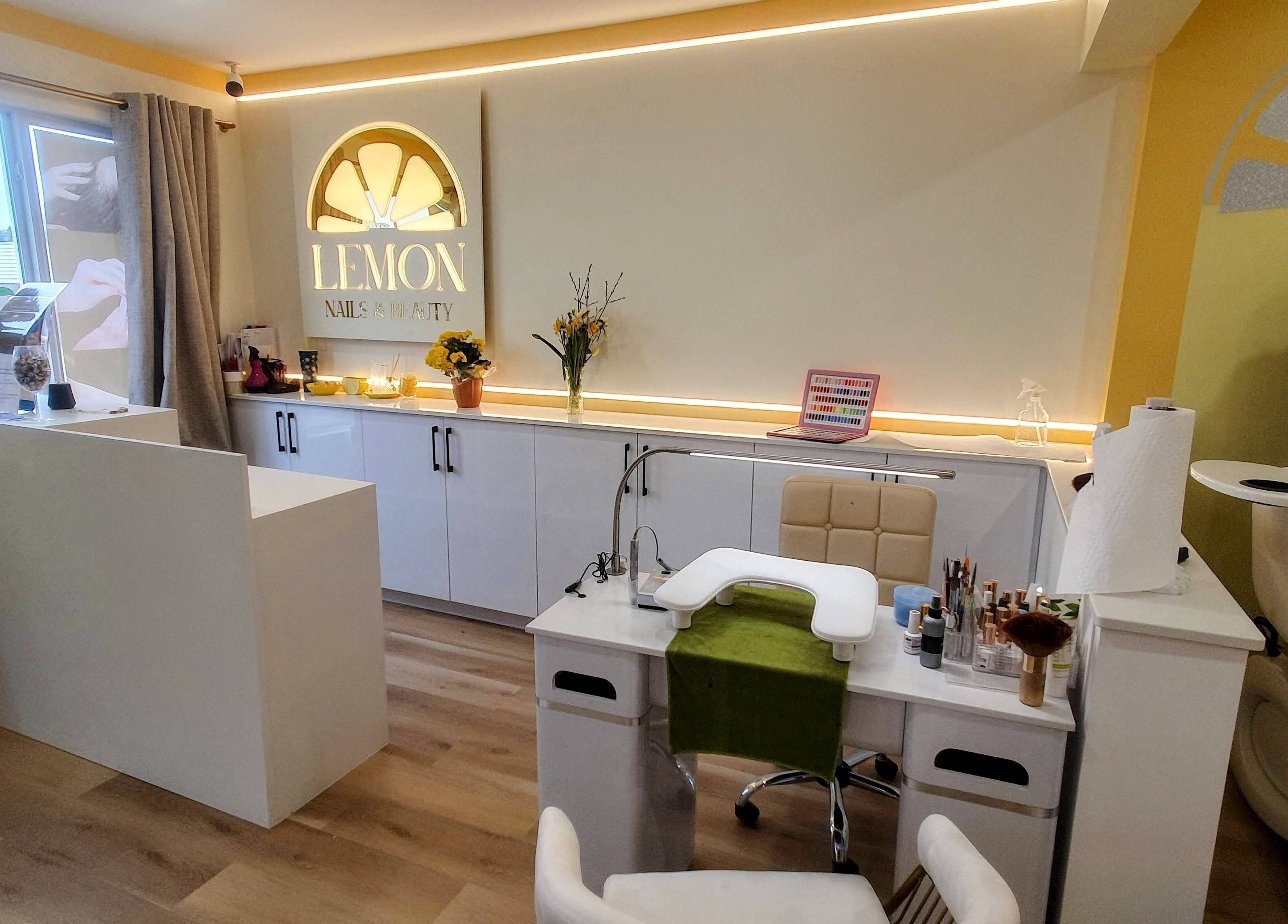 Interior of Lemon Nails and Beauty in Prince George, BC, featuring modern nail stations and stylish decor.