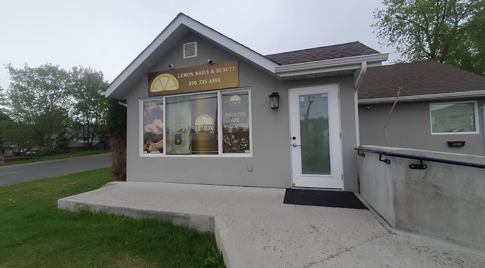 Exterior of Lemon Nails and Beauty, Prince George, British Columbia, CA showcasing manicured entrance.