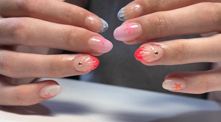 Stylish nail art at Polished by Victoria, Redruth, England, GB, with vibrant colors and elegant designs.