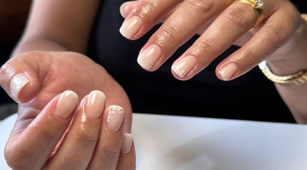 Close-up of polished nails with floral design at Polished by Victoria, Redruth, England, GB.
