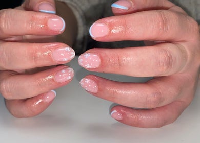 Elegant floral nail art at Polished by Victoria, Redruth, England, GB.