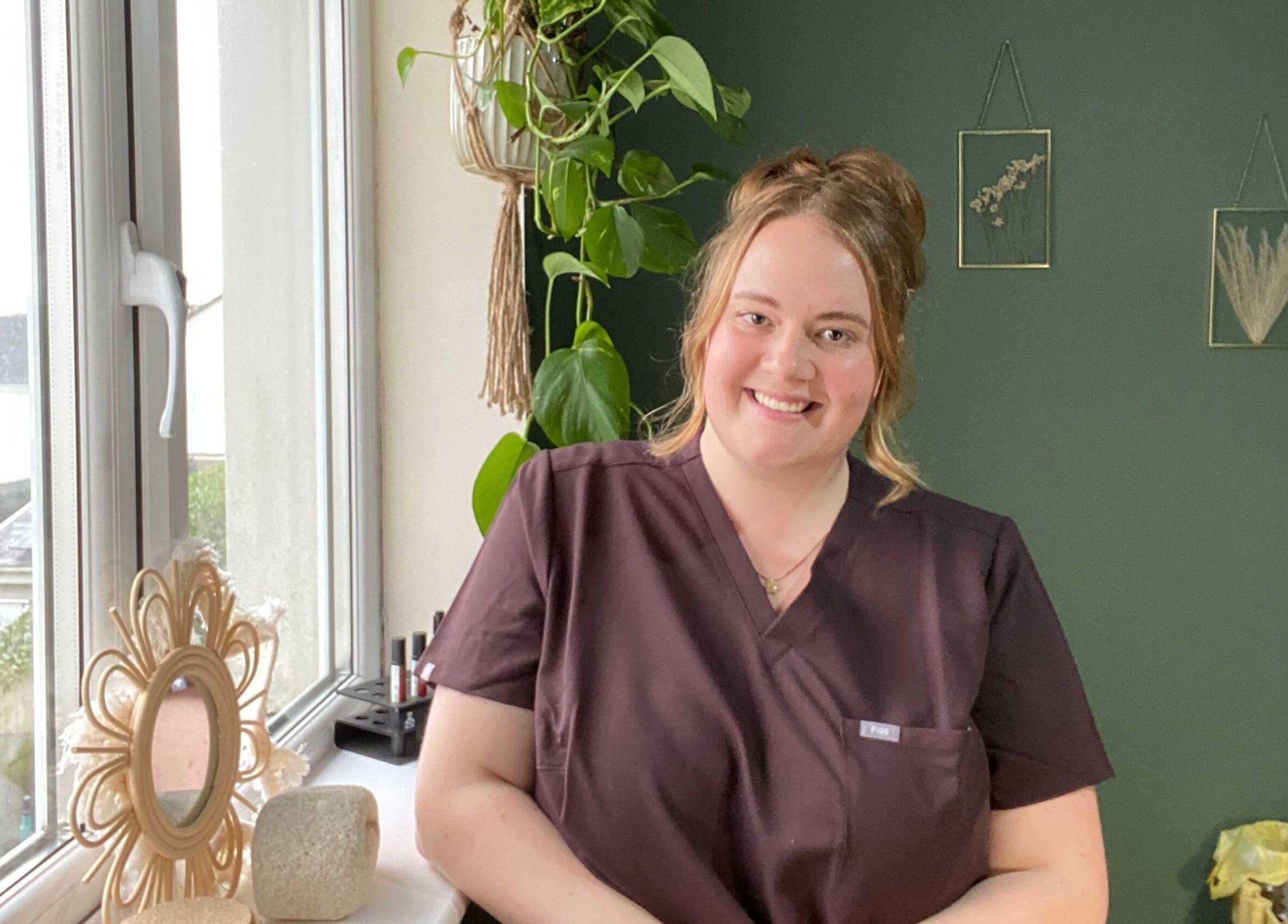 Friendly stylist at Polished by Victoria in Redruth, England, GB, ready to serve clients.