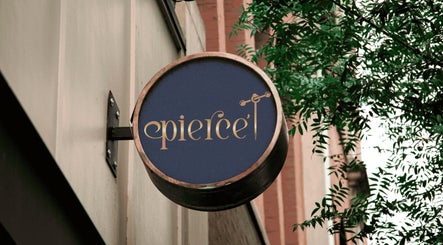 Pierce’T salon signage in Curaçao, Curaçao, CW, featuring elegant logo design on rustic background.