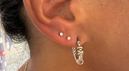 Elegant diamond-studded earring showcase at Pierce’T, Curaçao, Curaçao, CW.