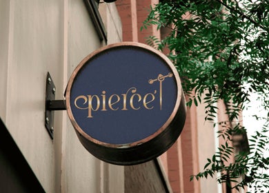 Elegant Pierce’T sign in Curaçao, Curaçao, CW enhancing the street view with lush greenery.